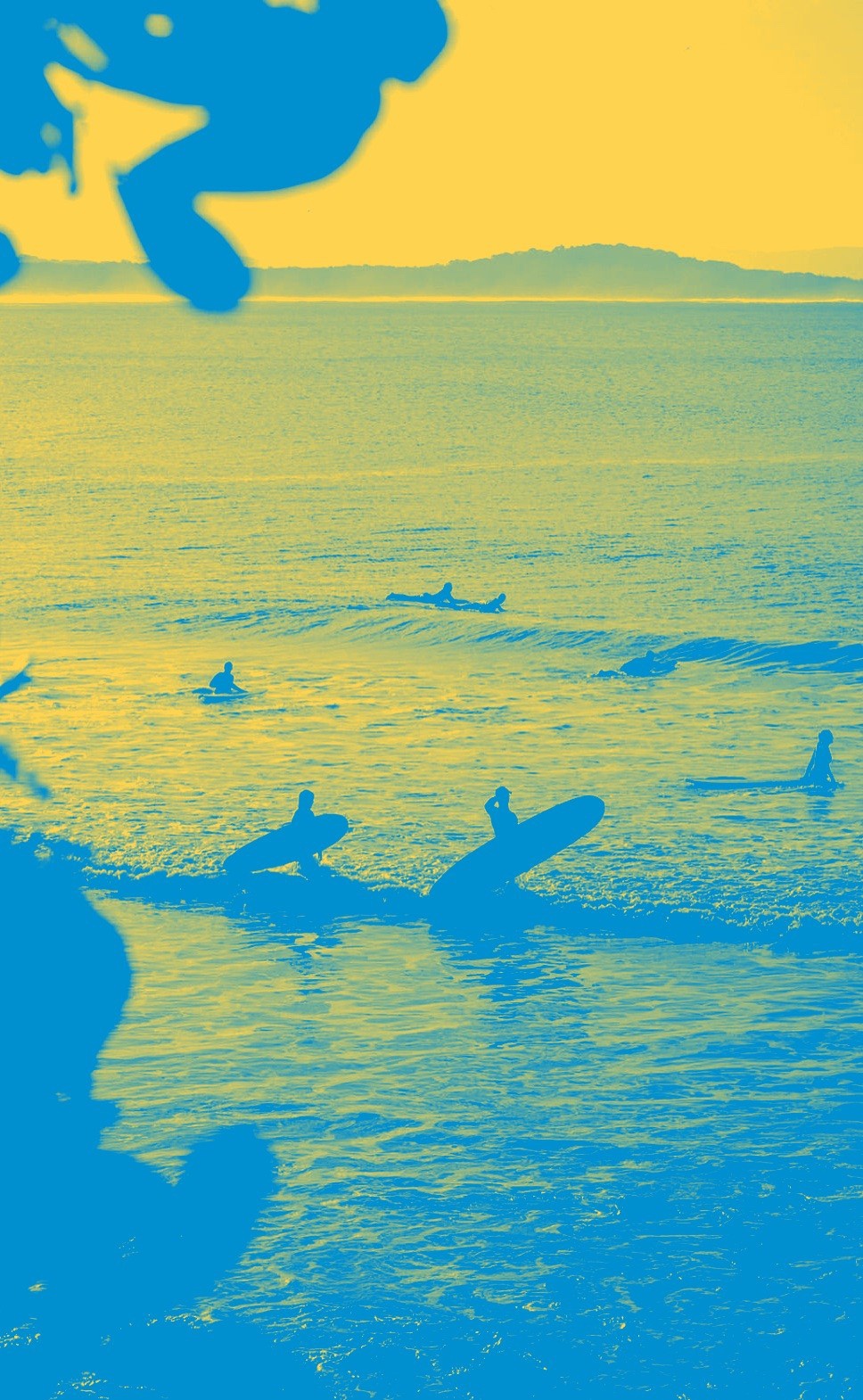 Surfers walking out through the shallows at the end of the day, in Beach Republic's two colours